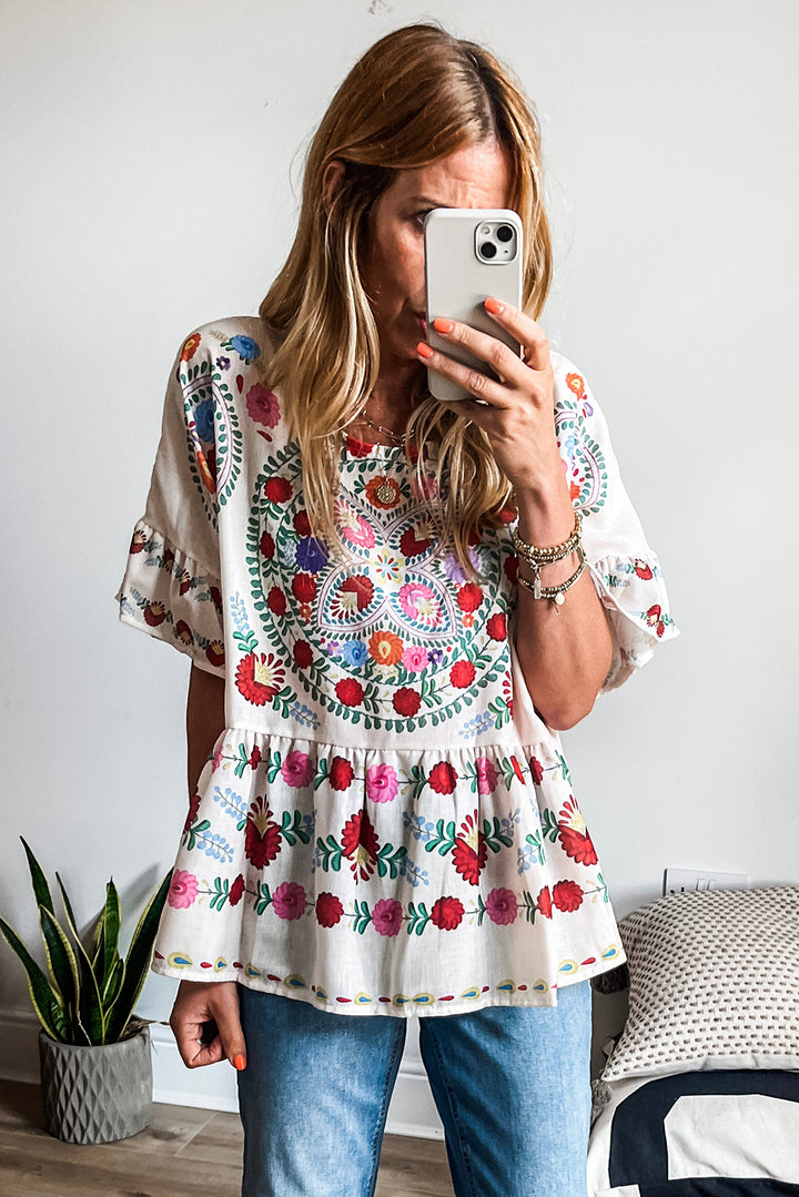 Bloom Fiesta Peplum Top 🌸
