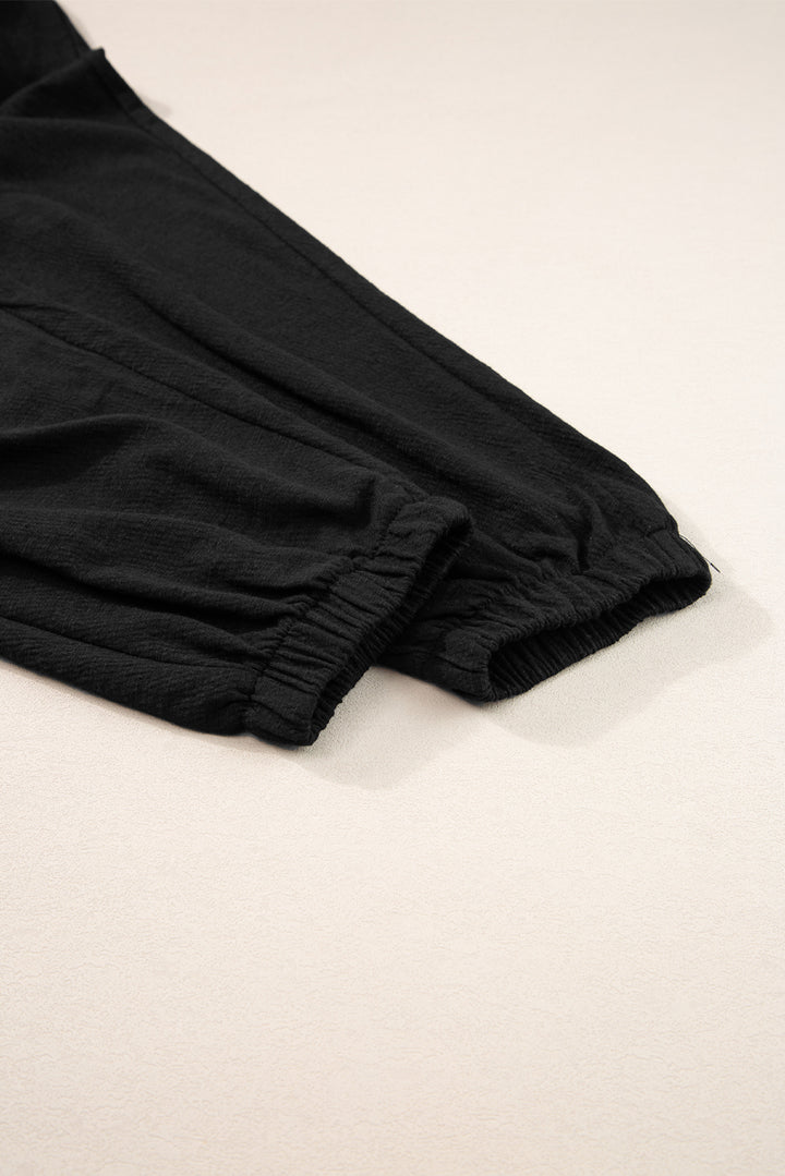 Ebony Shirred High Waist Sleeveless V Neck Jumpsuit