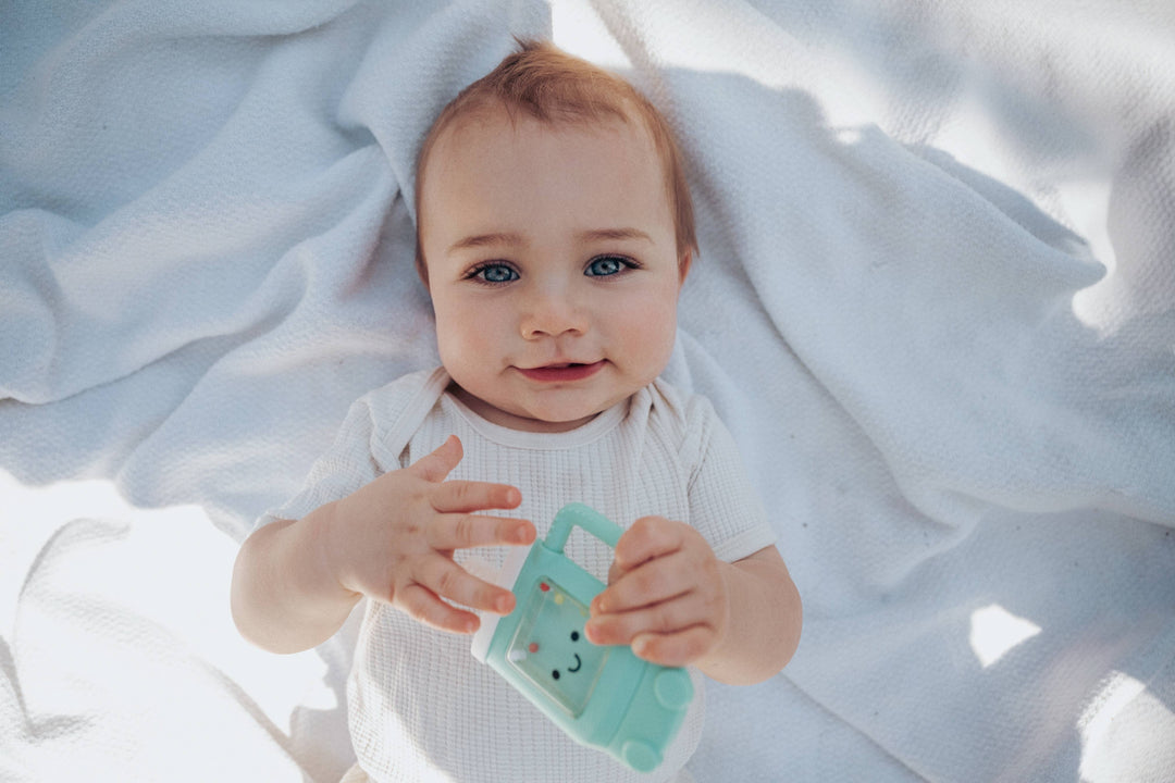 Itzy Ritzy - *NEW OPTION* Sweetie Shake Plus™ - Teething + Rattle Toy