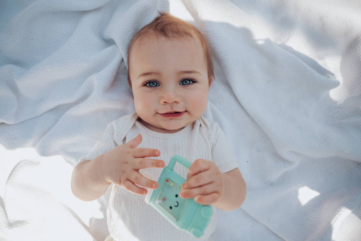 Itzy Ritzy - *NEW OPTION* Sweetie Shake Plus™ - Teething + Rattle Toy