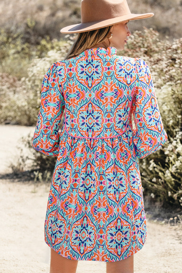 Abstract Printed Long Sleeve Tie Ruffle Neckline Mini Dress