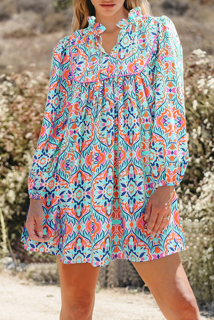 Abstract Printed Long Sleeve Tie Ruffle Neckline Mini Dress